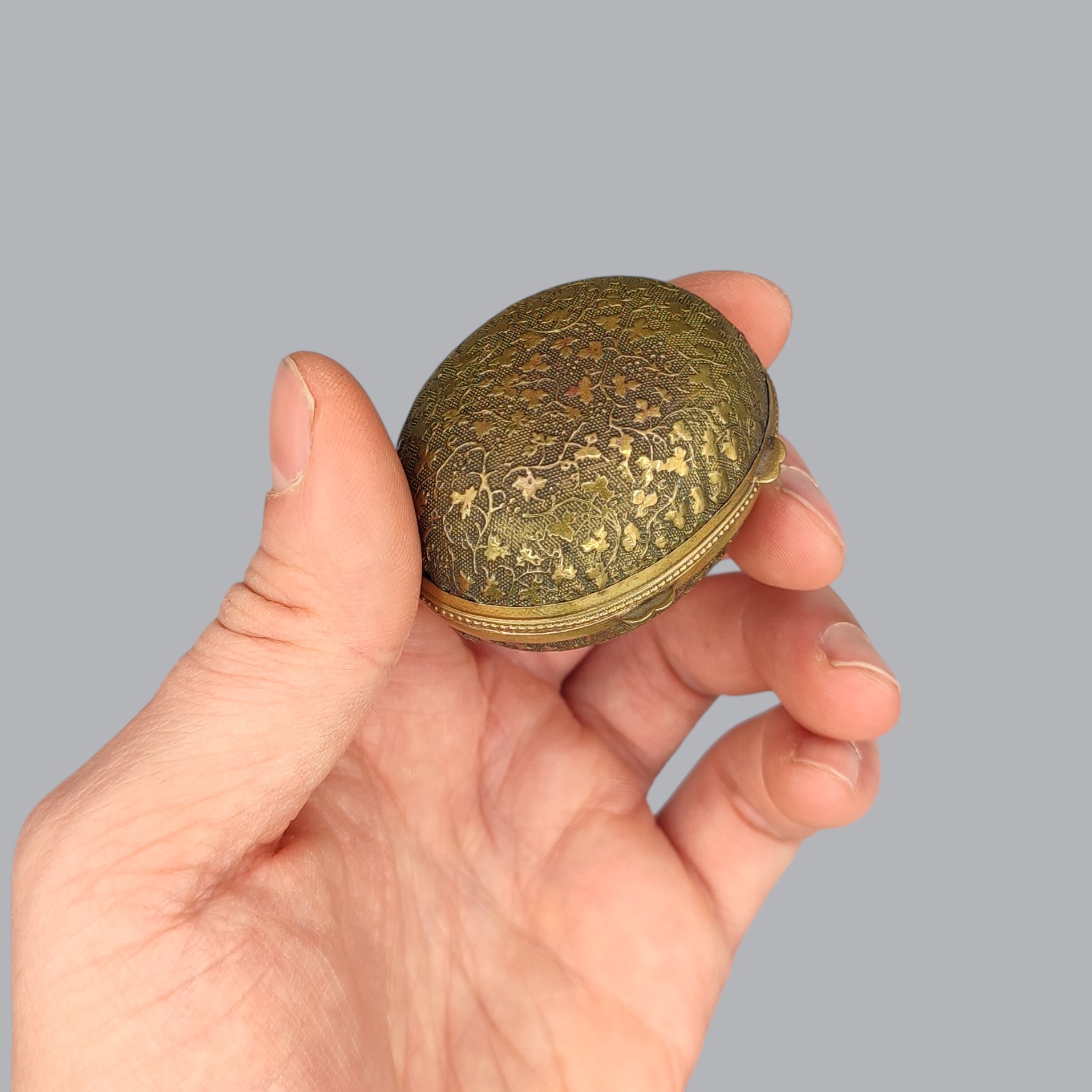 FRENCH EGG-SHAPED BRASS THIMBLE BOX