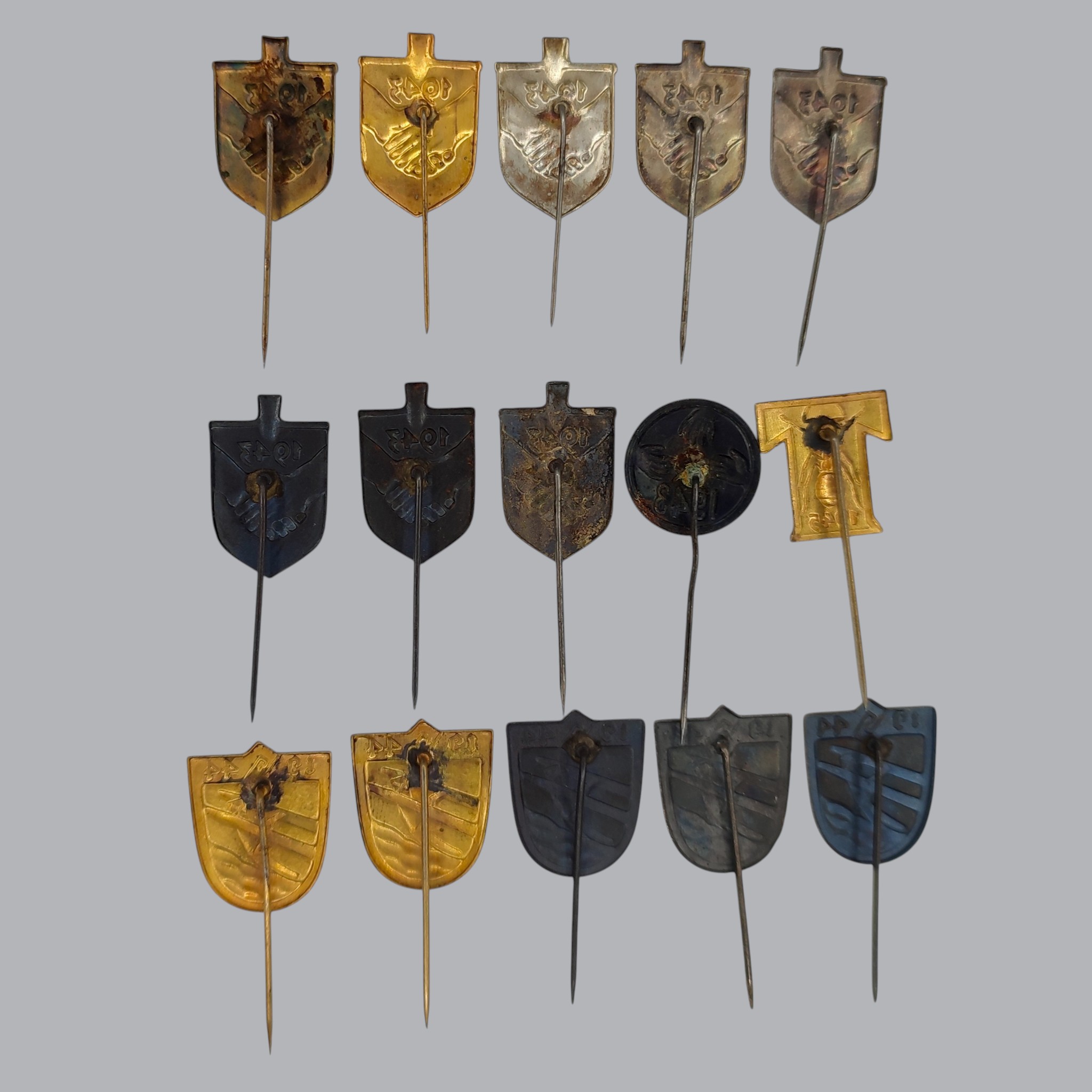 FINNISH WWII SET OF 15 NATIONAL VOLUNTARY WORK BADGES
